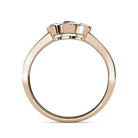 Prsten s tri kamena iolita i dijamantom od 0,5 karata u ružičastom zlatu od 14 karata.veličina 7,0